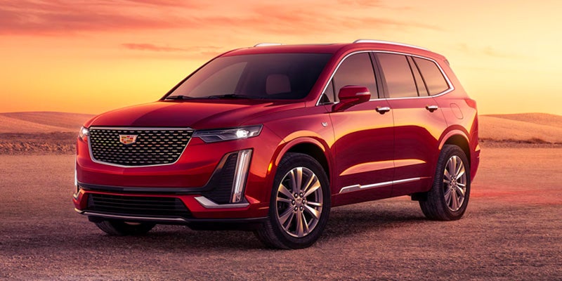 2025 Cadillac XT6 with the Sun Setting Behind Greenville, NC